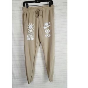 Nike HBR Fleece Tech Pants Have A Nike Day in Tan, sz Small
